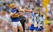 10 July 2011; Padraic Maher, Tipperary, in action against Brian O'Sullivan, Waterford. Munster GAA Hurling Senior Championship Final, Waterford v Tipperary, Pairc Ui Chaoimh, Cork. Picture credit: Diarmuid Greene / SPORTSFILE