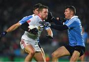 11 February 2017; Niall Sludden of Tyrone in action against David Byrne, left, and Darren Daly of Dublin during the Allianz Football League Division 1 Round 2 match between Dublin and Tyrone at Croke Park in Dublin. Photo by Ray McManus/Sportsfile