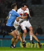 11 February 2017; Aidan McCory of Tyrone slips past Dublin's Brian Fenton and  Michael Fitzsimons on his way to score his side's goal during the Football League Division 1 Round 2 match between Dublin and Tyrone at Croke Park in Dublin. Photo by Ray McManus/Sportsfile
