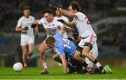 11 February 2017; Eoghan O'Gara of Dublin in action against Justin McMahon, Cathal McCarron and Roanan McNamee of Tyrone during the Allianz Football League Division 1 Round 2 match between Dublin and Tyrone at Croke Park in Dublin. Photo by Ray McManus/Sportsfile