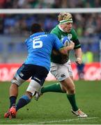 11 February 2017; James Tracy of Ireland is tackled by Maxime Mbanda of Italy during the RBS Six Nations Rugby Championship match between Italy and Ireland at the Stadio Olimpico in Rome, Italy. Photo by Ramsey Cardy/Sportsfile