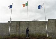 12 February 2017; Keith Hanratty raises the Irish Tricolour flag before the Allianz Football League Division 1 Round 2 game between Monaghan and Cavan at St. Mary's Park in Castleblayney, Co. Monaghan. Photo by Philip Fitzpatrick/Sportsfile
