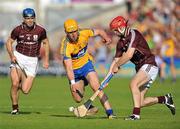2 July 2011; John Conlon, Clare, in action against David Collins, left, and Adrian Cillinane, Galway. GAA Hurling All-Ireland Senior Championship, Phase 2, Galway v Clare, Pearse Stadium, Galway. Picture credit: Barry Cregg / SPORTSFILE