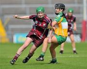 2 July 2011; Ann Marie Starr, Galway, in action against Marion Crean, Offaly. All-Ireland Senior Camogie Championship, Round 4, in association with RTE Sport, Galway v Offaly, Pearse Stadium, Galway. Picture credit: Barry Cregg / SPORTSFILE