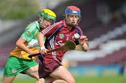 2 July 2011; Sandra Tannian, Galway, in action against Lorraine Keena, Offaly. All-Ireland Senior Camogie Championship, Round 4, in association with RTE Sport, Galway v Offaly, Pearse Stadium, Galway. Picture credit: Barry Cregg / SPORTSFILE