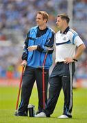 10 July 2011; Injured Dublin players Paul Griffin, left, and Philly McMahon look on during the team's warm-up before the game. Leinster GAA Football Senior Championship Final, Dublin v Wexford, Croke Park, Dublin. Picture credit: Brendan Moran / SPORTSFILE