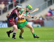 2 July 2011; Lorraine Keena, Offaly, in action against Tara Rutledge, Galway. All-Ireland Senior Camogie Championship, Round 4, in association with RTE Sport, Galway v Offaly, Pearse Stadium, Galway. Picture credit: Barry Cregg / SPORTSFILE