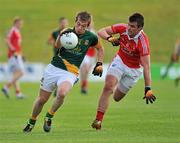 29 June 2011; Robert Farrelly, Meath in action against Daniel Grimes, Louth. Leinster GAA Football Minor Championship, Semi-Final, Meath v Louth, Pairc Tailteann, Navan, Co. Meath. Picture credit: Barry Cregg / SPORTSFILE