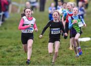 12 February 2017; Lucy Lynch, left, of Carraig-Na-Bhfear AC Co Cork goes past Lucy Sheridan of Dunleer AC Co Louth on her way to winning the girls under-11 1000m during the Irish Life Health National Masters & Juvenile B XC Championships at Waterford I.T. in Waterford. Photo by Matt Browne/Sportsfile