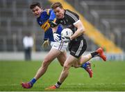 12 February 2017; Kevin McDonnell of Sligo in action against Michael Quinlivan of Tipperary during the Allianz Football League Division 3 Round 2 game between Tipperary and Sligo at Semple Stadium in Thurles, Co. Tipperary. Photo by Seb Daly/Sportsfile