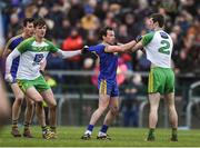 12 February 2017; Niall Kilroy of Roscommon tussles with Jason McGee, left, and Caolan Ward of Donegal during the Allianz Football League Division 1 Round 2 game between Roscommon and Donegal at Dr. Hyde Park in Roscommon. Photo by David Maher/Sportsfile