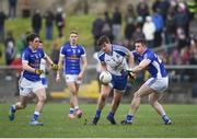 12 February 2017; Darren Hughes of Monaghan in action against Niall Clerkin, left, and Tomas Corr of Cavan during the Allianz Football League Division 1 Round 2 game between Monaghan and Cavan at St. Mary's Park in Castleblayney, Co. Monaghan. Photo by Philip Fitzpatrick/Sportsfile