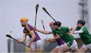 12 February 2017; Podge Doran of Wexford in action against Declan Hannon, left, and Stephen Cahill of Limerick during the Allianz Hurling League Division 1B Round 1 game between Wexford and Limerick at Innovate Wexford Park in Wexford. Photo by Daire Brennan/Sportsfile