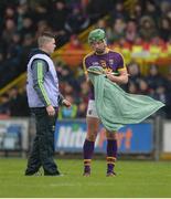 12 February 2017; Conor McDonald of Wexford dries his hurl before hitting a free during the Allianz Hurling League Division 1B Round 1 game between Wexford and Limerick at Innovate Wexford Park in Wexford. Photo by Daire Brennan/Sportsfile