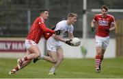 12 February 2017; Daniel Flynn of Kildare in action against Aidan Walsh of Cork, as Ian Maguire looks on, during the Allianz Football League Division 2 Round 2 game between Kildare and Cork at St Conleth's Park in Newbridge, Co. Kildare. Photo by Piaras Ó Mídheach/Sportsfile