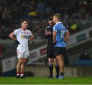 11 February 2017; Referee Joe McQuillan notes the name of Jonny Cooper of Dublin before issuing him a yellow card and ultimately issuing a red card to Mark Bradley of Tyrone, left, during the Allianz Football League Division 1 Round 2 match between Dublin and Tyrone at Croke Park in Dublin. Photo by Ray McManus/Sportsfile