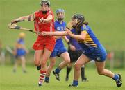 16 July 2011; Gemma O'Connor, Cork, in action against Sheila Ryan, Tipperary. All-Ireland Senior Camogie Championship in association with RTE Sport, Cork v Tipperary, Cork Institute of Technology, Bishopstown, Cork. Picture credit: Barry Cregg / SPORTSFILE