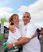 16 July 2011; Dee Byrne-Dunne, from Co. Kildare, and Eamon Hayes, from Dublin, celebrate finishing The National Lottery Irish Runner 5 Mile. Phoenix Park, Dublin. Picture credit: Tomas Greally / SPORTSFILE