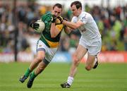 16 July 2011; Graham Reilly, Meath, in action against Michael Foley, Kildare. GAA Football All-Ireland Senior Championship Qualifier, Round 3, Meath v Kildare, Pairc Tailteann, Navan, Co. Meath. Picture credit: Pat Murphy / SPORTSFILE