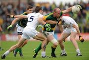 16 July 2011; Joe Sheridan, Meath, in action against Gary White, left, and Hugh McGrillen, Kildare. GAA Football All-Ireland Senior Championship Qualifier, Round 3, Meath v Kildare, Pairc Tailteann, Navan, Co. Meath. Picture credit: Pat Murphy / SPORTSFILE