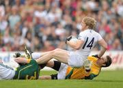 16 July 2011; Tomas O'Connor, Kildare, is brought down in the box by Meath players Kevin Reilly and goalkeeper Brendan Murphy, right, to earn his side a penalty. GAA Football All-Ireland Senior Championship Qualifier, Round 3, Meath v Kildare, Pairc Tailteann, Navan, Co. Meath. Photo by Sportsfile