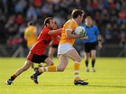 16 July 2011; James Loughrey, Antrim, in action against Conor Laverty, Down. GAA Football All-Ireland Senior Championship Qualifier, Round 3, Antrim v Down, Casement Park, Belfast, Co. Antrim. Picture credit: Oliver McVeigh / SPORTSFILE