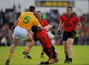 16 July 2011; Conor Laverty, Down, in action against Tony Scullion, Antrim. GAA Football All-Ireland Senior Championship Qualifier, Round 3, Antrim v Down, Casement Park, Belfast, Co. Antrim. Picture credit: Oliver McVeigh / SPORTSFILE