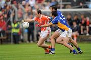 16 July 2011; Malachy Mackin, Armagh, in action against Alan Byrne, 3, and Anthony McLoughlin, Wicklow. GAA Football All-Ireland Senior Championship Qualifier, Round 2, Replay, Wicklow v Armagh, County Grounds, Aughrim, Co. Wicklow. Picture credit: Ray McManus / SPORTSFILE