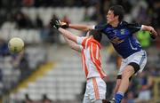 17 July 2011; Gerard Smith, Cavan, in action against Conor McNally, Armagh. Ulster GAA Football Minor Championship Final, Armagh v Cavan, St Tiernach's Park, Clones, Co. Monaghan. Picture credit: Brian Lawless / SPORTSFILE