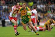 17 July 2011; Colm McFadden, Donegal, in action against Kevin McGuckin, Derry. Ulster GAA Football Senior Championship Final, Derry v Donegal, St Tiernach's Park, Clones, Co. Monaghan. Picture credit: Brian Lawless / SPORTSFILE