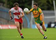 17 July 2011; Ryan Bradley, Donegal, in action against Charlie Kielt, Derry. Ulster GAA Football Senior Championship Final, Derry v Donegal, St Tiernach's Park, Clones, Co. Monaghan. Picture credit: Brian Lawless / SPORTSFILE