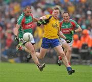 17 July 2011; Trevor Mortimer, Mayo, in action against Peter Domican, Roscommon. Connacht GAA Football Senior Championship Final, Roscommon v Mayo, Dr. Hyde Park, Roscommon. Picture credit: David Maher / SPORTSFILE
