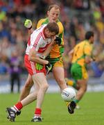 17 July 2011; Enda Muldoon, Derry, in action against Colm McFadden, Donegal. Ulster GAA Football Senior Championship Final, Derry v Donegal, St Tiernach's Park, Clones, Co. Monaghan. Picture credit: Brian Lawless / SPORTSFILE