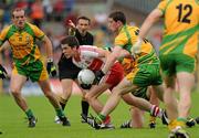17 July 2011; Dermot McBride, Derry, in action against Patrick McBrearty, Donegal. Ulster GAA Football Senior Championship Final, Derry v Donegal, St Tiernach's Park, Clones, Co. Monaghan. Picture credit: Brian Lawless / SPORTSFILE