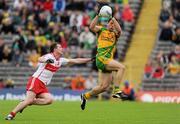 17 July 2011; Ryan Bradley, Donegal, in action against Barry McGoldrick, Derry. Ulster GAA Football Senior Championship Final, Derry v Donegal, St Tiernach's Park, Clones, Co. Monaghan. Picture credit: Brian Lawless / SPORTSFILE