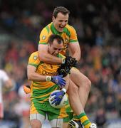 17 July 2011; Donegal captain Michael Murphy celebrates with team-mate Karl Lacey at the final whistle. Ulster GAA Football Senior Championship Final, Derry v Donegal, St Tiernach's Park, Clones, Co. Monaghan. Picture credit: Brian Lawless / SPORTSFILE