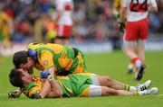 17 July 2011; Donegal captain Michael Murphy, top, celebrates with team-mate Karl Lacey at the final whistle. Ulster GAA Football Senior Championship Final, Derry v Donegal, St Tiernach's Park, Clones, Co. Monaghan. Picture credit: Brian Lawless / SPORTSFILE