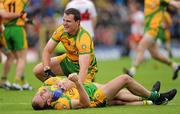 17 July 2011; Donegal captain Michael Murphy celebrates with team-mates Karl Lacey, hidden, and Neil Gallagher at the final whistle. Ulster GAA Football Senior Championship Final, Derry v Donegal, St Tiernach's Park, Clones, Co. Monaghan. Picture credit: Brian Lawless / SPORTSFILE