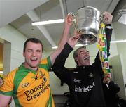17 July 2011; Donegal manager Jim McGuinness, right, and Captain Michael Murphy enters the changing room with the Anglo Celt cup. Ulster GAA Football Senior Championship Final, Derry v Donegal, St Tiernach's Park, Clones, Co. Monaghan. Picture credit: Oliver McVeigh / SPORTSFILE
