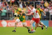 17 July 2011; Anthony Thompson, Donegal, in action against Barry McGoldrick, Derry. Ulster GAA Football Senior Championship Final, Derry v Donegal, St Tiernach's Park, Clones, Co. Monaghan. Picture credit: Brendan Moran / SPORTSFILE