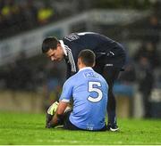 11 February 2017; Dublin captain Stephen Cluxton attends to team mate James McCarthy during the Allianz Football League Division 1 Round 2 match between Dublin and Tyrone at Croke Park in Dublin. Photo by Ray McManus/Sportsfile