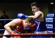 11 February 2017; Thomas Carty, of Glasnevin, exchanges punches with Bernard O’Reilly of Portlaoise in their 91+kg bout during the 2016 IABA Elite Boxing Championships at the National Stadium in Dublin. Photo by Cody Glenn/Sportsfile