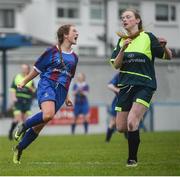 14 February 2017; Phoenix Mulcaire Shire of Coláiste na Trócaire Rathkeale celebrates scoring her side's second goal as Aisling McNulty of Sacred Heart School Westport looks on during the Bank of Ireland FAI Schools Senior Girls National Cup Final match between Sacred Heart School Westport and Coláiste na Trócaire Rathkeale at Home Farm FC in Whitehall, Dublin.  Photo by Cody Glenn/Sportsfile