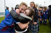 14 February 2017; Joanne Foley of Coláiste na Trócaire Rathkeale is hugged by her sister Aine Foley, age 11, after her side's victory in the Bank of Ireland FAI Schools Senior Girls National Cup Final match between Sacred Heart School Westport and Coláiste na Trócaire Rathkeale at Home Farm FC in Whitehall, Dublin. Photo by Cody Glenn/Sportsfile