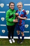 14 February 2017; Coláiste na Trócaire Rathkeale joint captain Eadaoin Lyons, right, is presented with the Player of the Match award from Roma McLaughlin Republic of Ireland Under-19 International and Peamount United player following her side's victory in the Bank of Ireland FAI Schools Senior Girls National Cup Final match between Sacred Heart School Westport and Coláiste na Trócaire Rathkeale at Home Farm FC in Whitehall, Dublin. Photo by Cody Glenn/Sportsfile