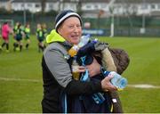 14 February 2017; Sacred Heart School Westport assistant coach Declan Moran has his hands full of water bottles and kit ahead of the Bank of Ireland FAI Schools Senior Girls National Cup Final match between Sacred Heart School Westport and Coláiste na Trócaire Rathkeale at Home Farm FC in Whitehall, Dublin. Photo by Cody Glenn/Sportsfile