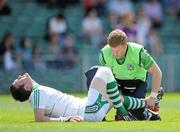 9 July 2011; Brian Scanlon, Limerick, is attended to by a Limerick physiotherapist. GAA Football All-Ireland Senior Championship Qualifier Round 2, Limerick v Offaly, Gaelic Grounds, Limerick. Picture credit: Stephen McCarthy / SPORTSFILE