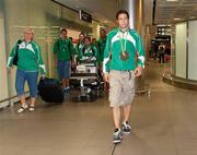 18 July 2011; Ireland's Brian Gregan, Silver Medalist in the Mens 400m, on his arrival in Dublin Airport as the Irish Team return from the European Under 23 Championships in Ostrava. Dublin Airport, Dublin. Picture credit: Barry Cregg / SPORTSFILE