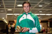 18 July 2011; Ireland's Brian Gregan, Silver Medalist in the Mens 400m, on his arrival in Dublin Airport as the Irish Team return from the European Under 23 Championships in Ostrava. Dublin Airport, Dublin. Picture credit: Barry Cregg / SPORTSFILE