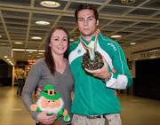 18 July 2011; Ireland's Brian Gregan, Silver Medalist in the Mens 400m, with his girlfriend Ciara McCallion, on his arrival in Dublin Airport as the Irish Team return from the European Under 23 Championships in Ostrava. Dublin Airport, Dublin. Picture credit: Barry Cregg / SPORTSFILE